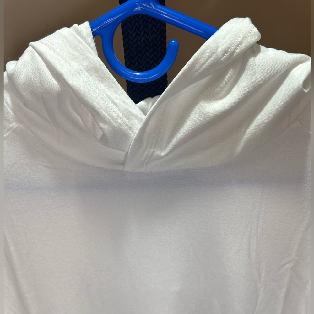 NWT True Classic white long sleeve shirt with hoodie. MEDIUM size. Never worn.